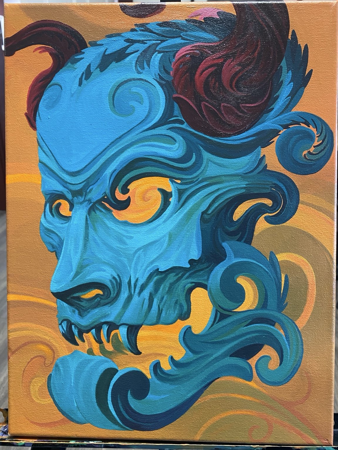 Turquoise fantasy face on orange